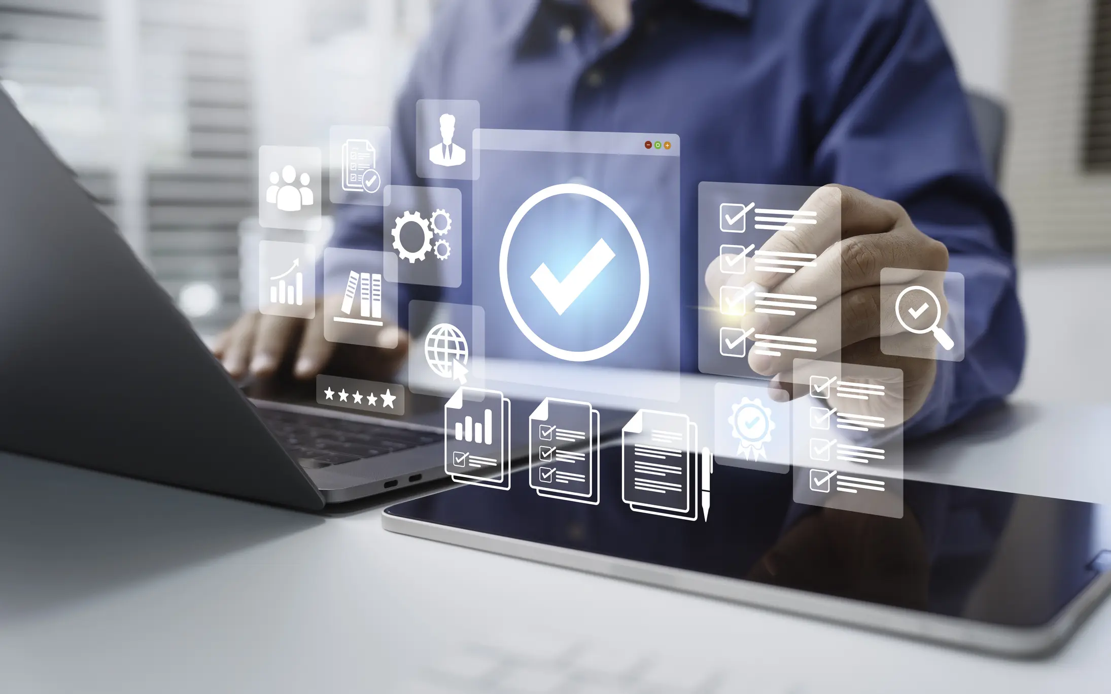 Businessperson interacting with transparent digital interface displaying checkmark and icons.